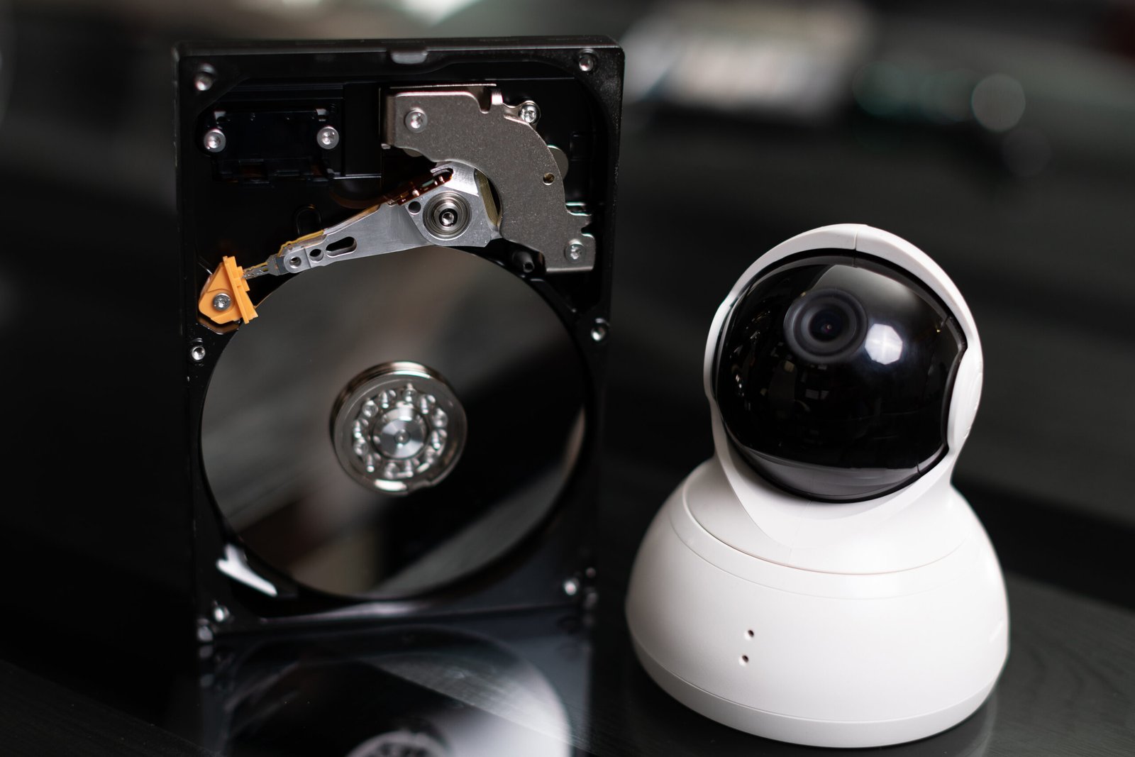 CCTV Camera Installation Melbourne 3 security camera and hard drive on black surface 2026 09 21 20 13 16 utc scaled